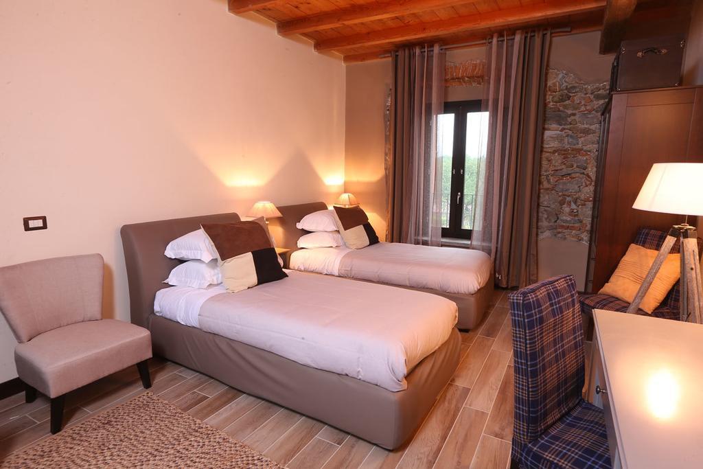 Hotel Equirelais Lomnago Pokoj fotografie